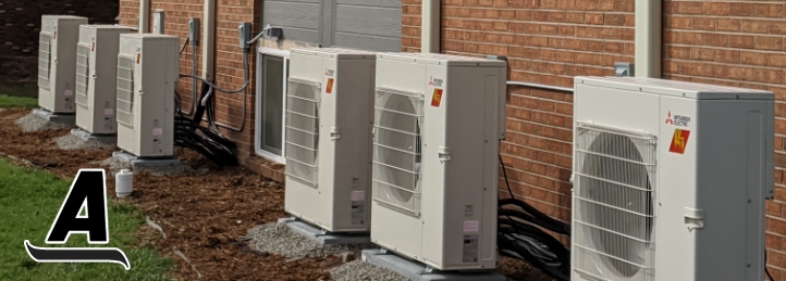 Heat pumps outside of an apartment building